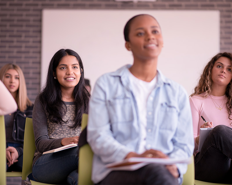 group of people sitting in a training